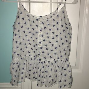 white peplum tank with blue design